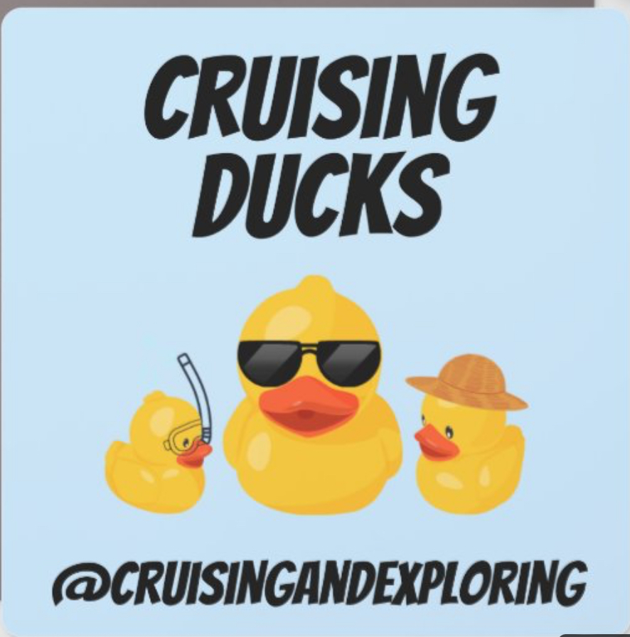 Cruising Ducks sign featuring our social channel name @cruisingandexploring